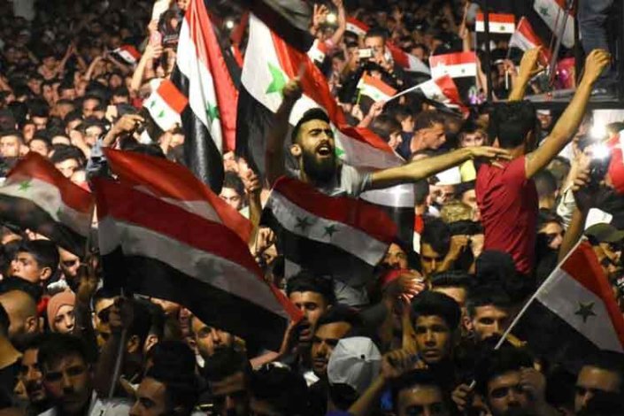 Centenas de milhares de pessoas festejaram a reeleição de Bashar al-Assad como presidente da Síria