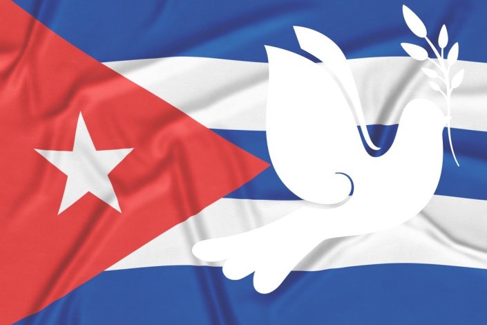 Bandeira cubana e símbolo da Paz