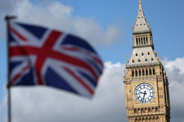 Bandeira do Reino Unido no exterior do Parlamento britânico, no dia do anúncio da realização, para 4 de Julho de 2024, de eleições gerais no país. Londres, 24 de Maio de 2024