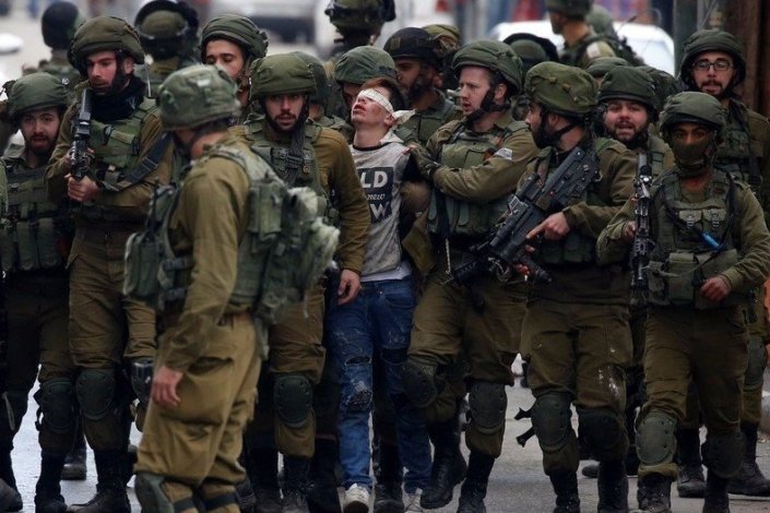 Jovem palestiniano preso por tropas israelitas na sequência do anúncio da decisão da administração norte-americana de mudara a Embaixada em Israel para Jerusalém