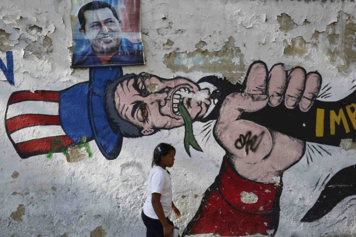 Retrato de graffiti com mulher. Caracas, Venezuela, 9 de Março de 2015. Os EUA tinham acabado de emitir sanções contra a Venezuela, a pretexto de que o país seria uma «ameaça à sua Segurança Nacional»